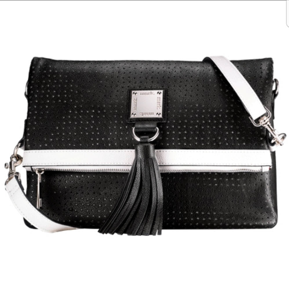 mark. Black and white convertible purse